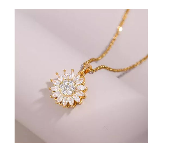 COLLAR CON DIJE DE GIRASOL GIRATORIO