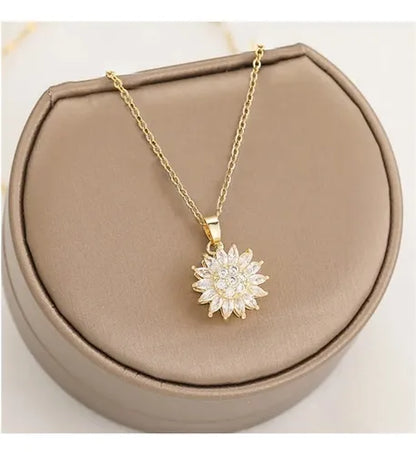 COLLAR CON DIJE DE GIRASOL GIRATORIO